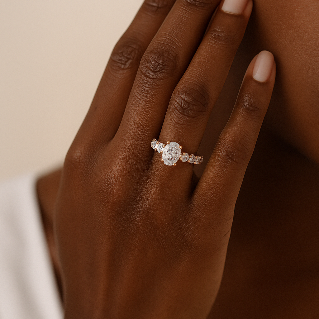 The Sigulda Ring - Oval Cut Solitaire on Shared-Prong Diamond Band