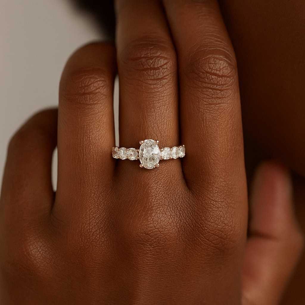 The Sigulda Ring - Oval Cut Solitaire on Shared-Prong Diamond Band