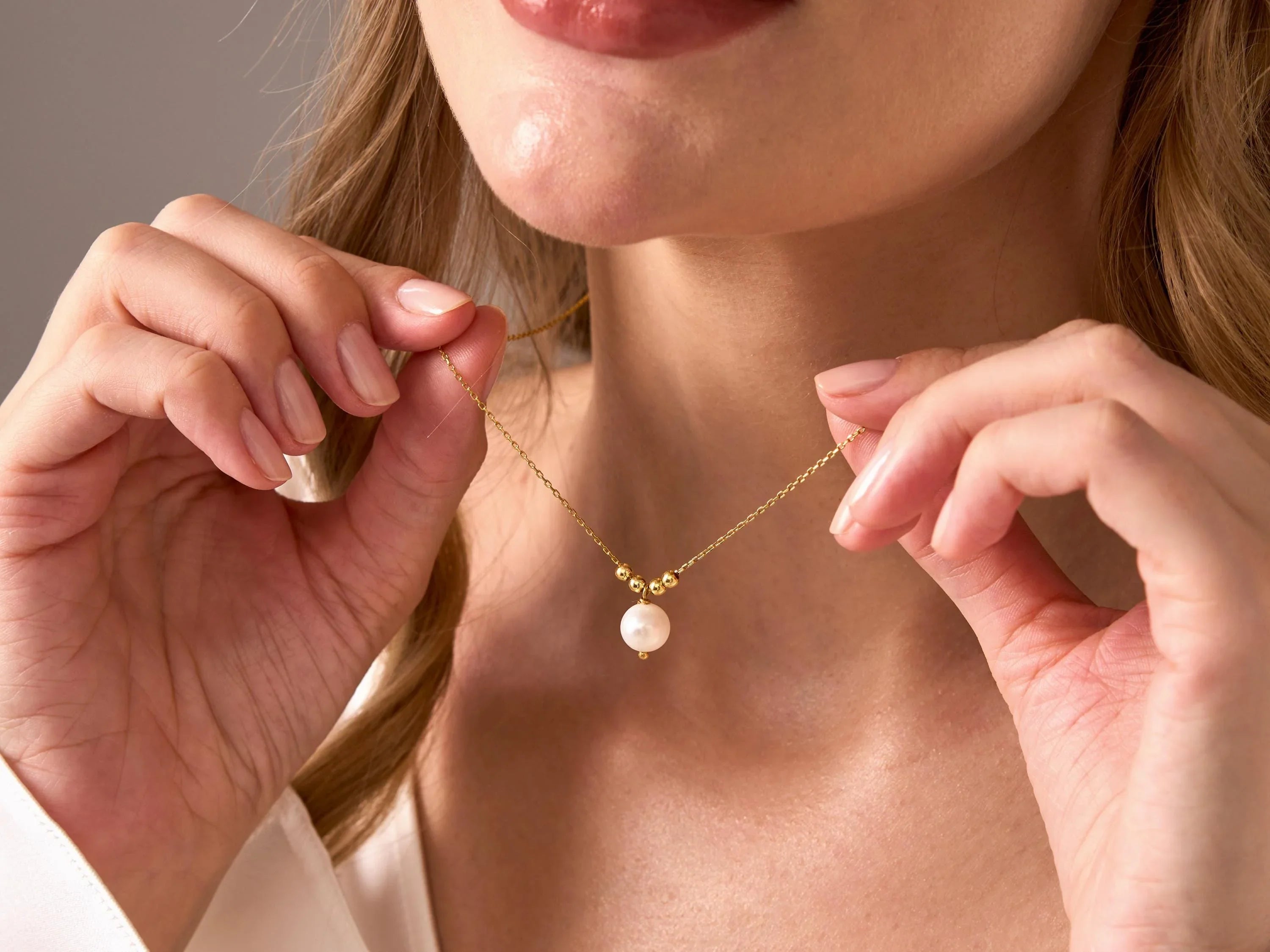 Elegant Gold Pearl Drop Necklace