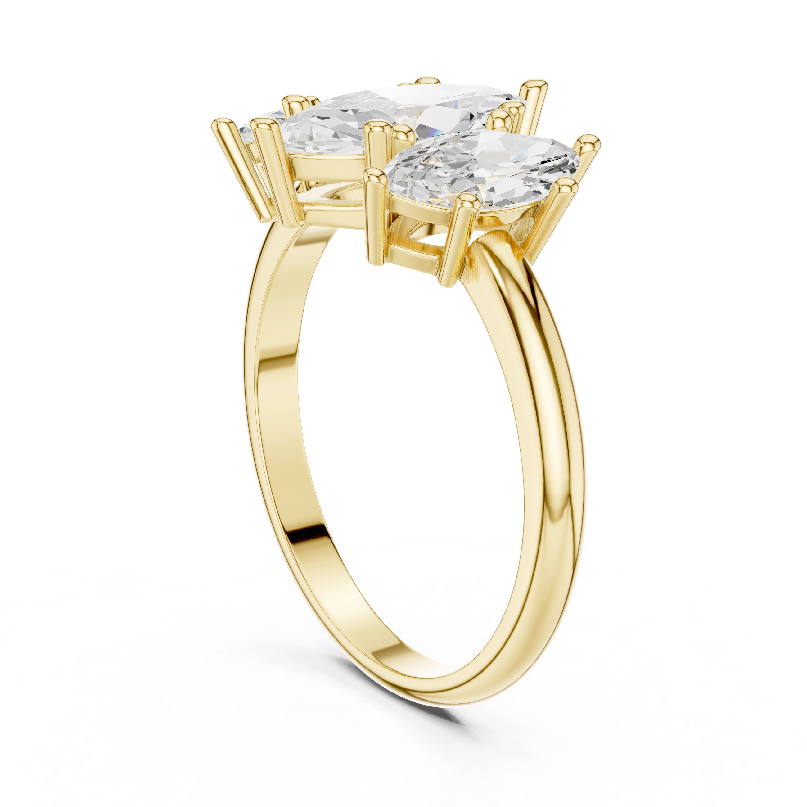 Gold ring with three clear gemstones on a white background