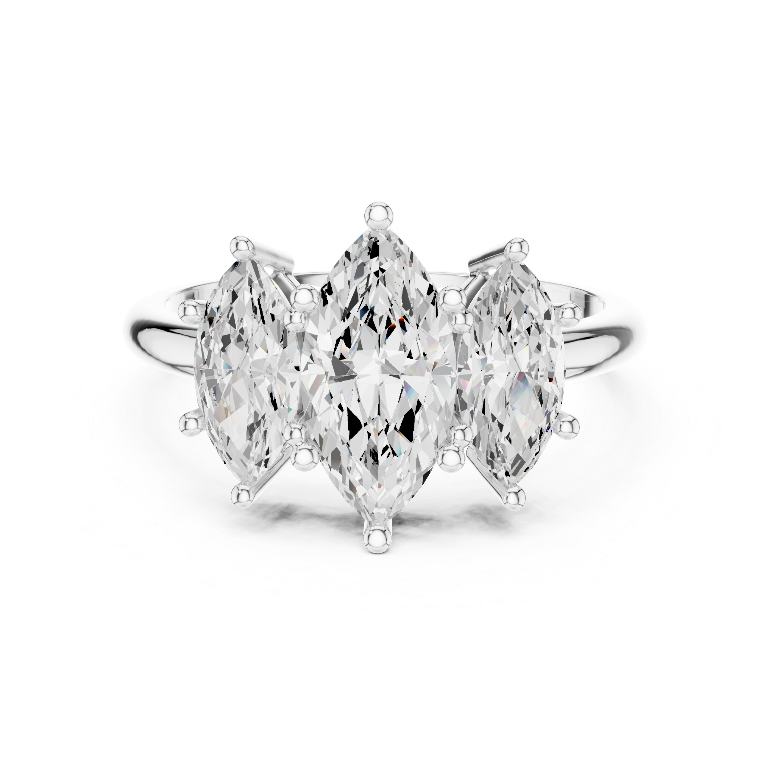 Three pear-shaped diamonds in a silver setting on a white background