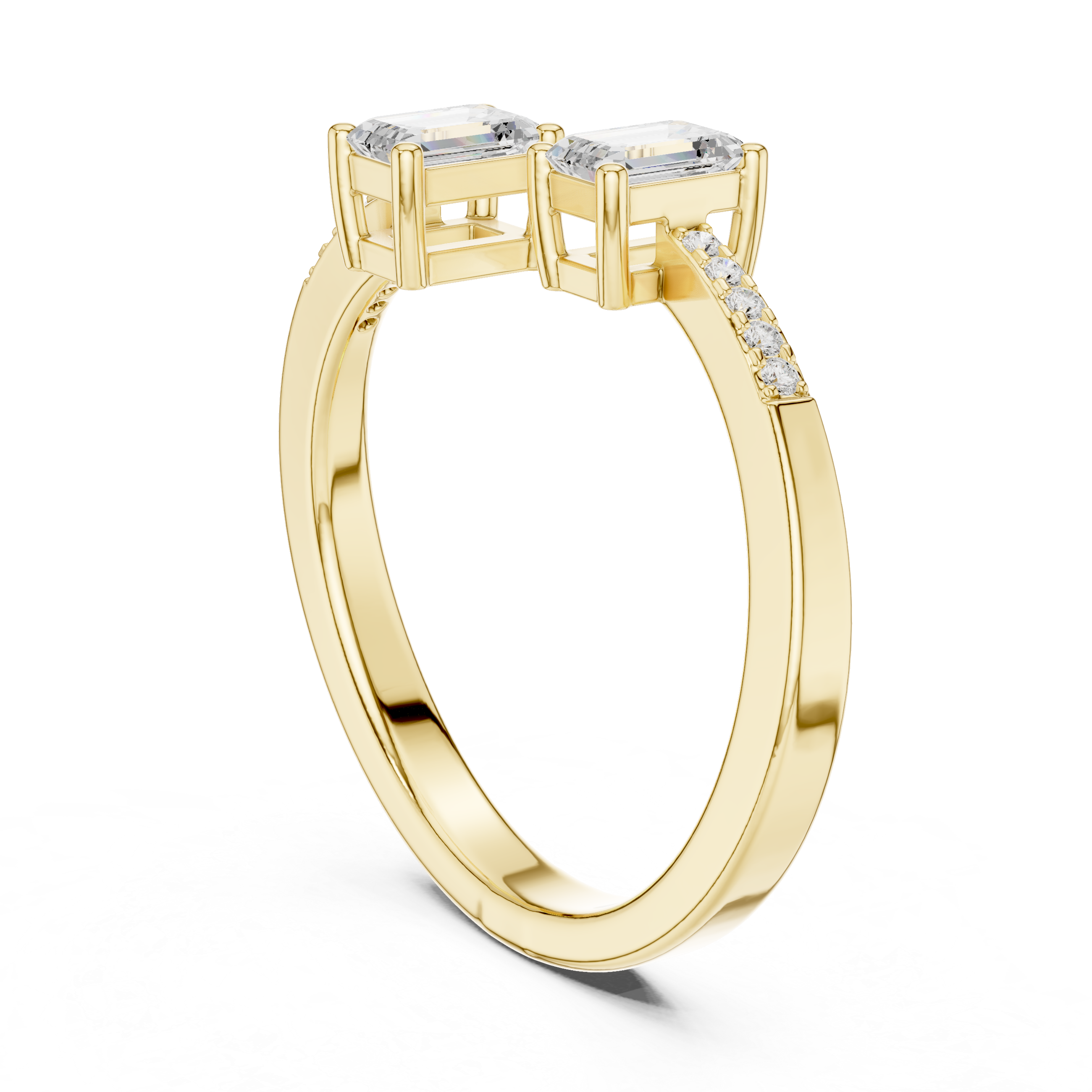 Gold ring with two rectangular gemstones on a white background