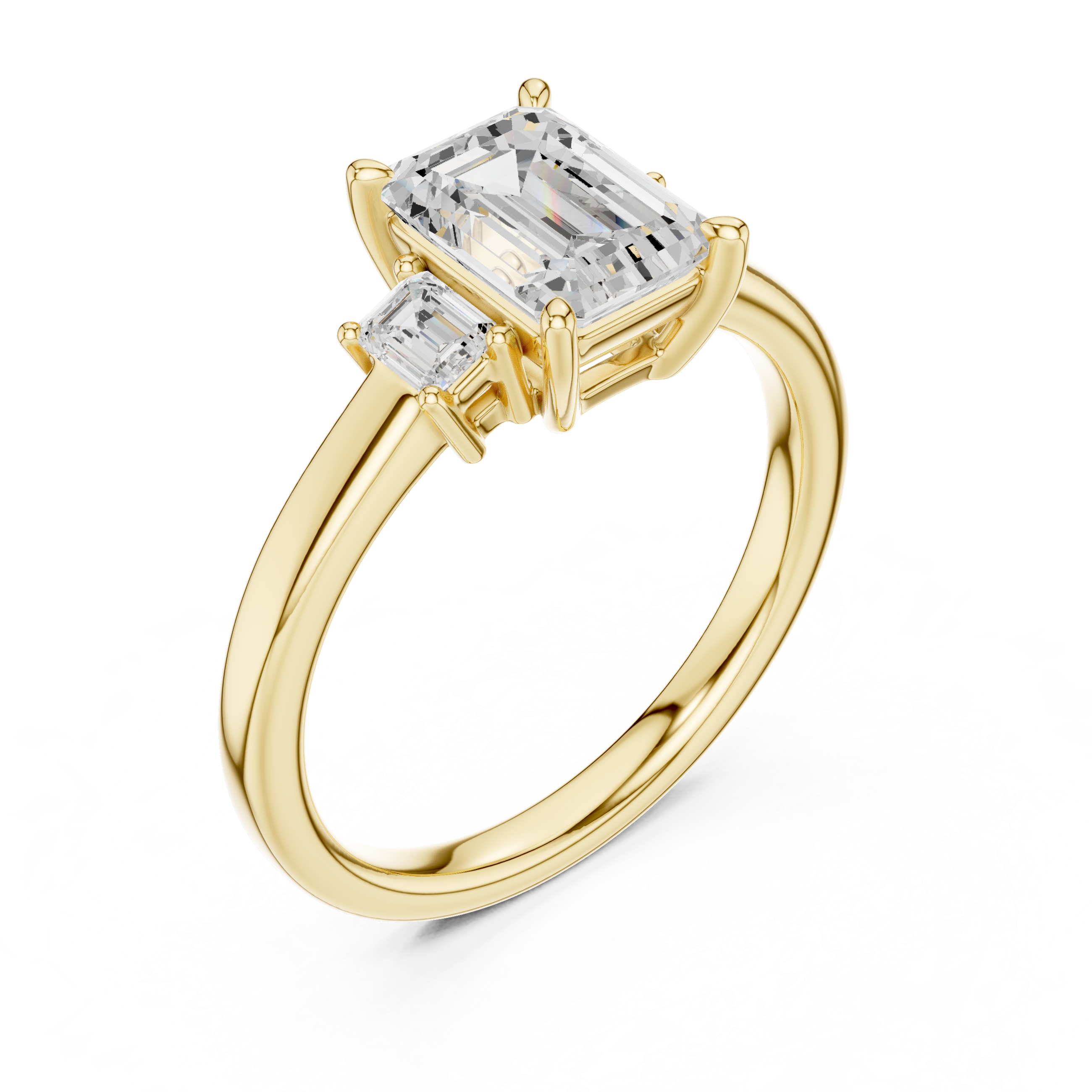 Gold ring with emerald-cut diamonds on a white background
